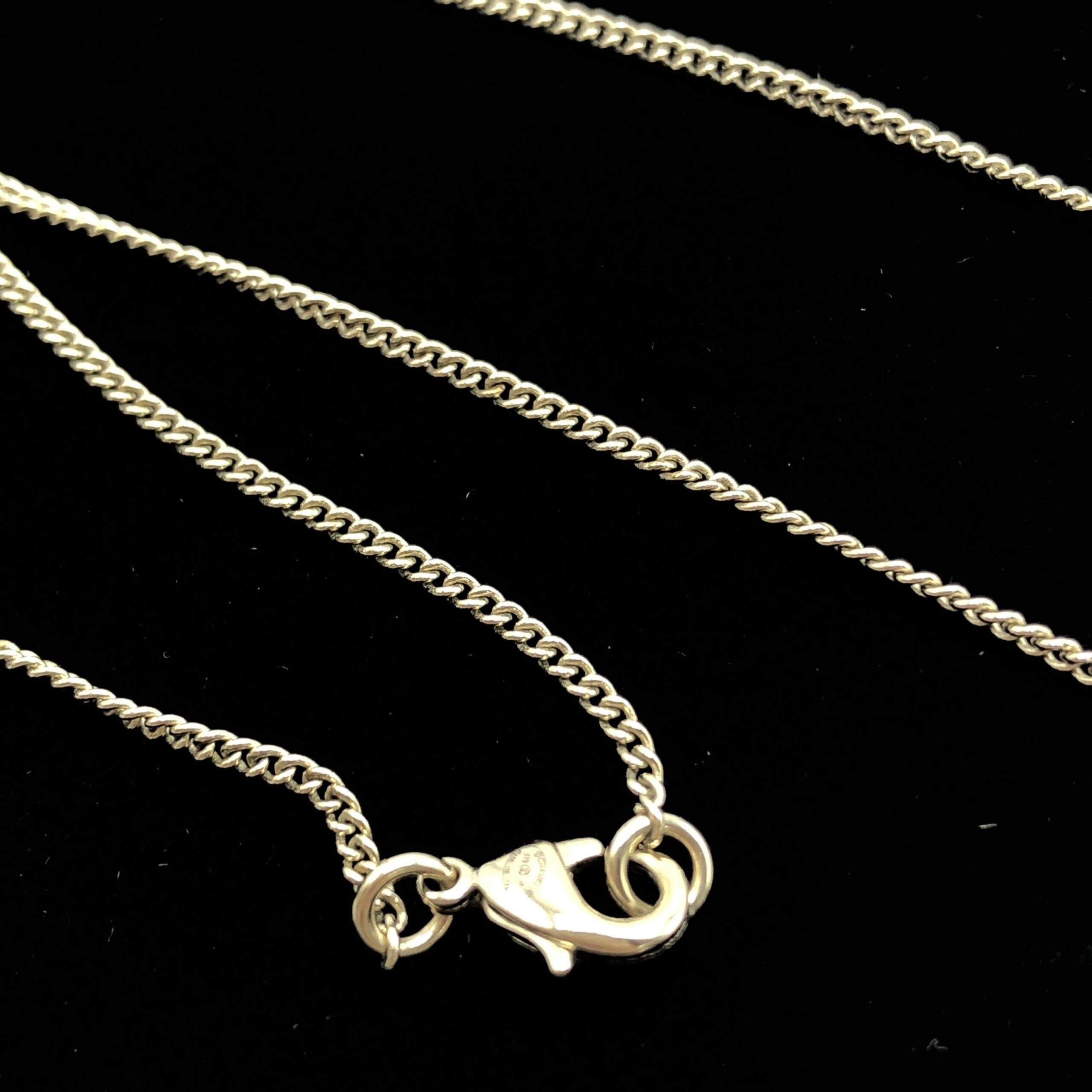 Chanel Gold Tone CC Circle Pendant Necklace