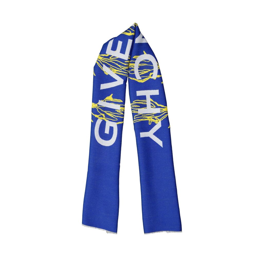 Experience the opulence of the Givenchy Blue Silk Scarf, a masterful blend of silk and wool, embodying timeless elegance and sophisticated allure for discerning individuals.