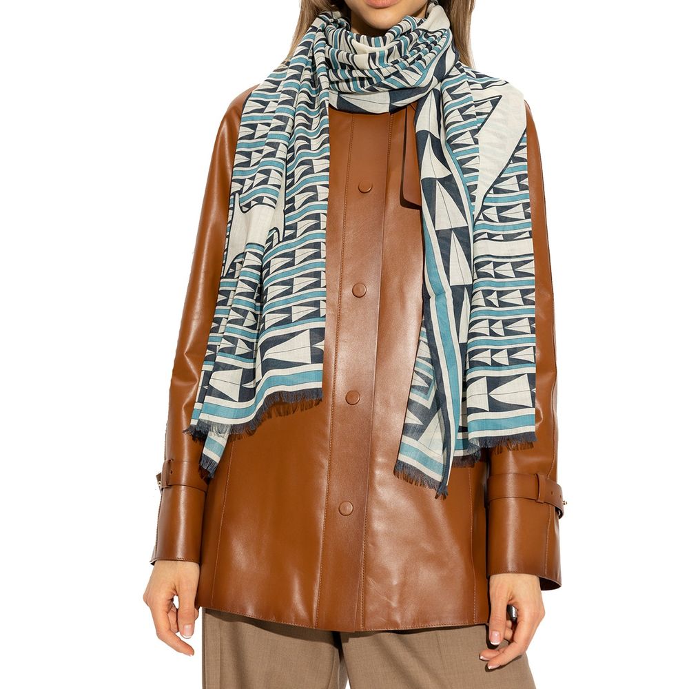 Indulge in the exquisite Lanvin Blue Wool Scarf, a masterpiece of 100% wool craftsmanship, embodying timeless luxury and sophisticated elegance for the discerning individual.