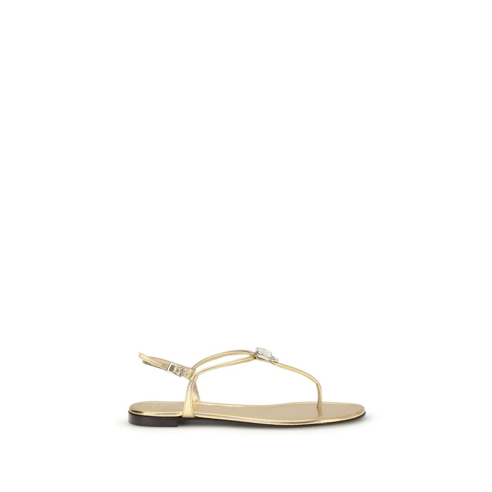 Elevate your elegance with Giuseppe Zanotti Gold Calf Leather Bos Taurus Flat Sandals, a luxurious blend of Italian craftsmanship and timeless sophistication, perfect for any occasion.