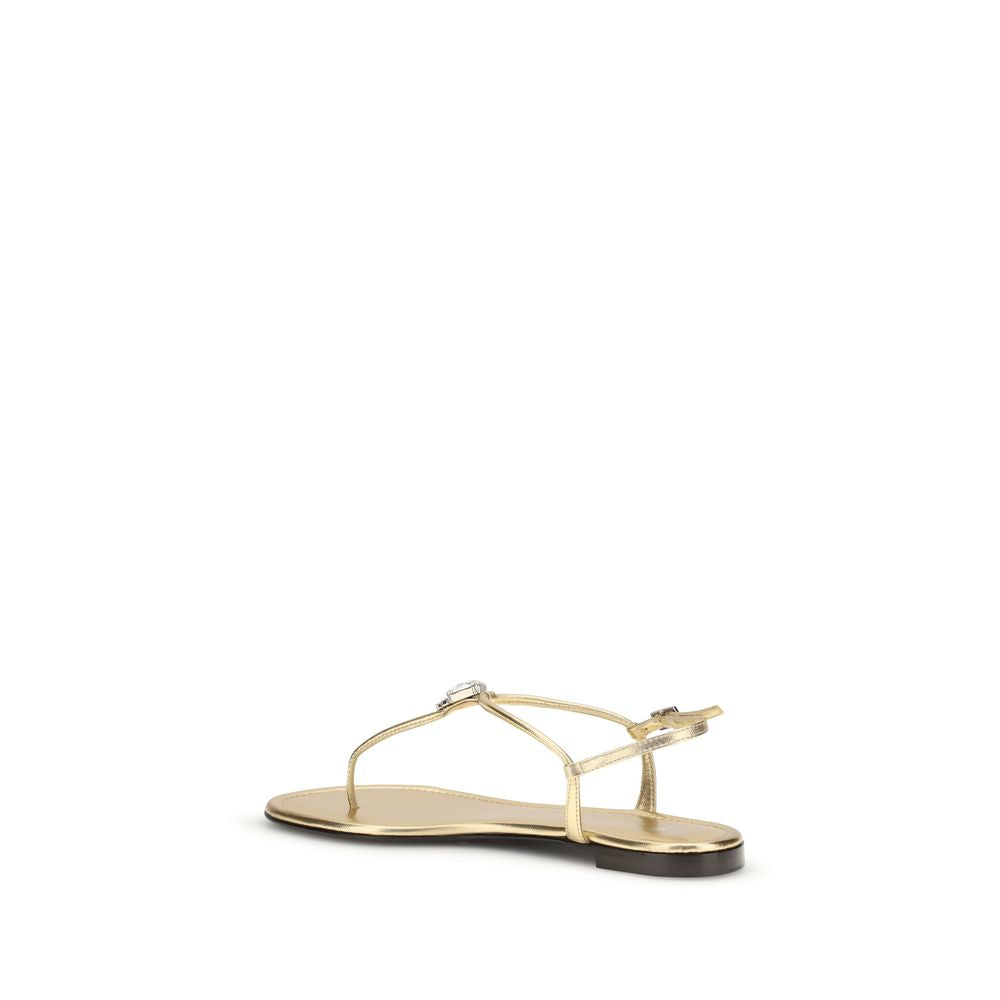 Experience the epitome of luxury with Giuseppe Zanotti Gold Calf Leather Bos Taurus Flat Sandals, where exquisite craftsmanship meets timeless elegance for the discerning connoisseur.
