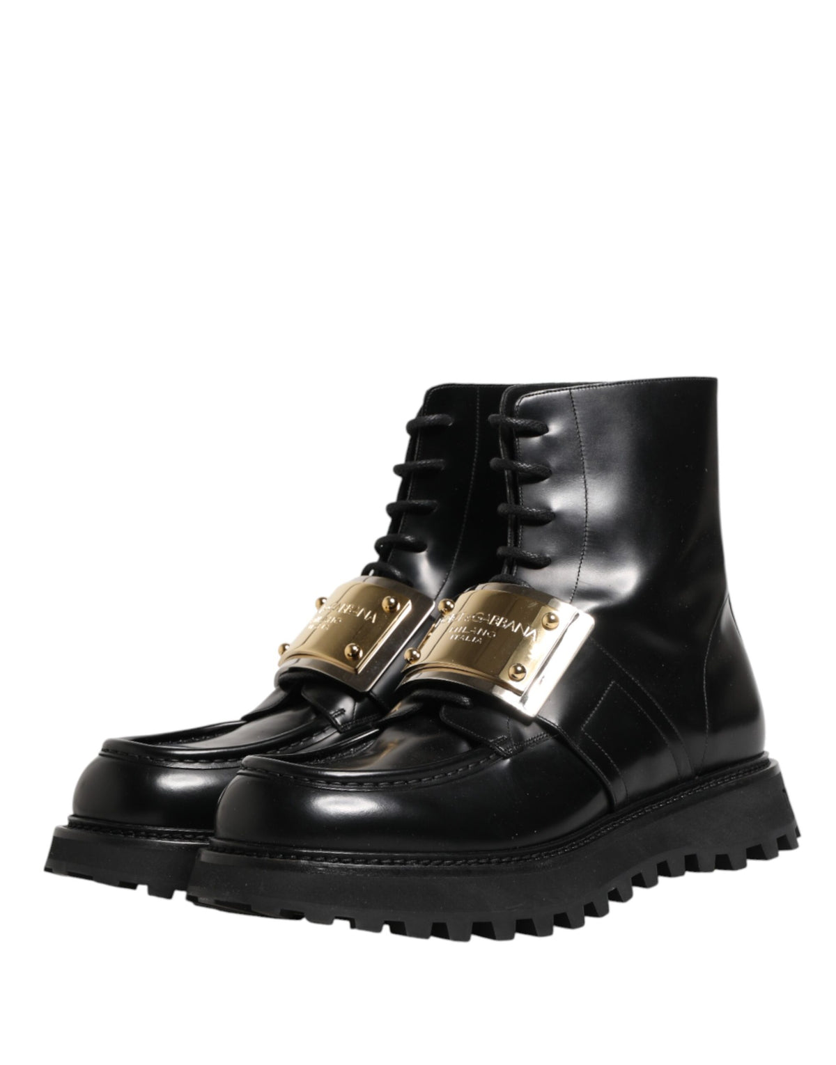 Elevate your style with Dolce & Gabbana's Black Leather DG Plaque Lace Up Boots, a testament to Italian craftsmanship that embodies luxury and timeless elegance.