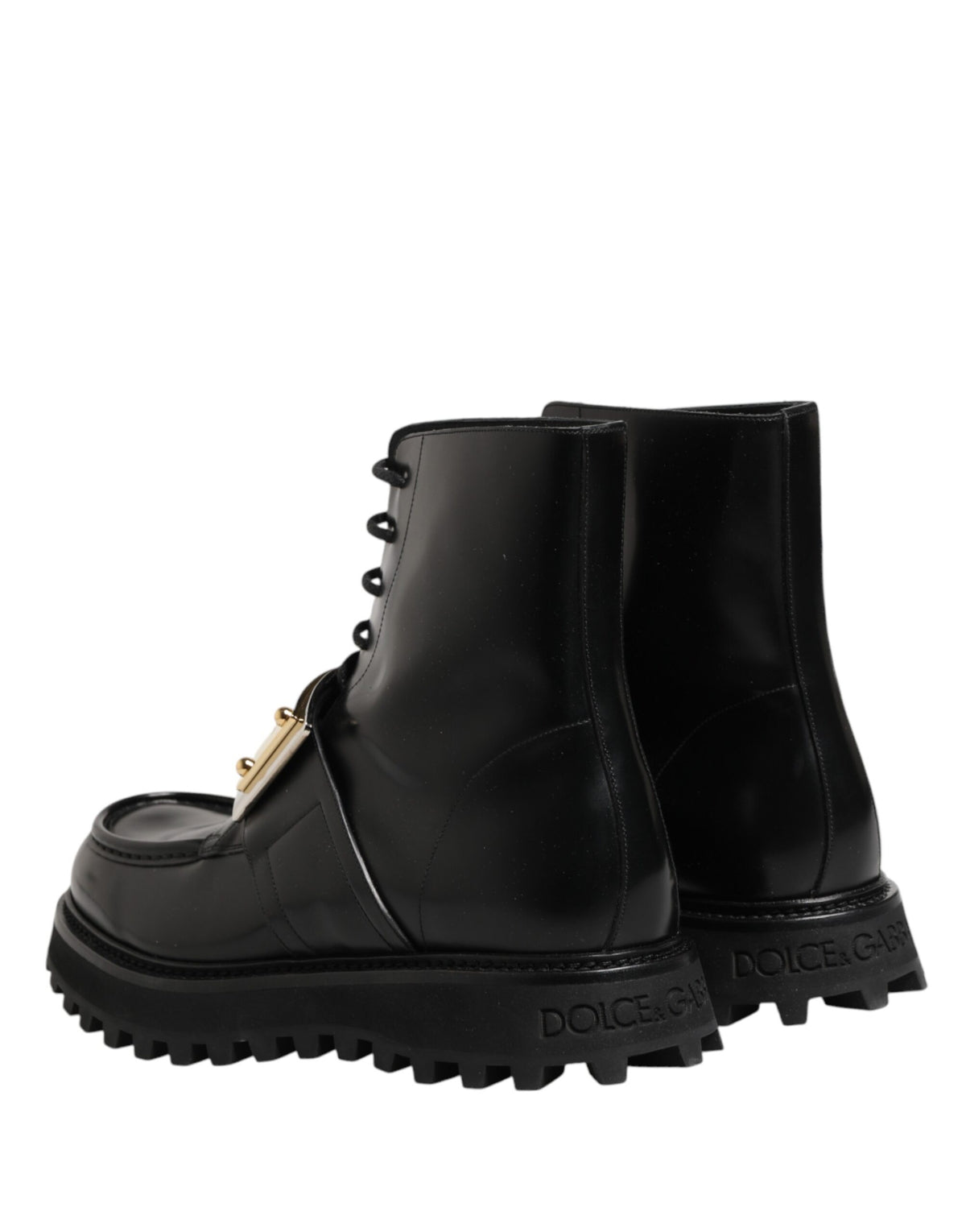 Elevate your style with Dolce & Gabbana's Black Leather DG Plaque Lace Up Boots, where exquisite Italian craftsmanship meets timeless elegance for the discerning individual.
