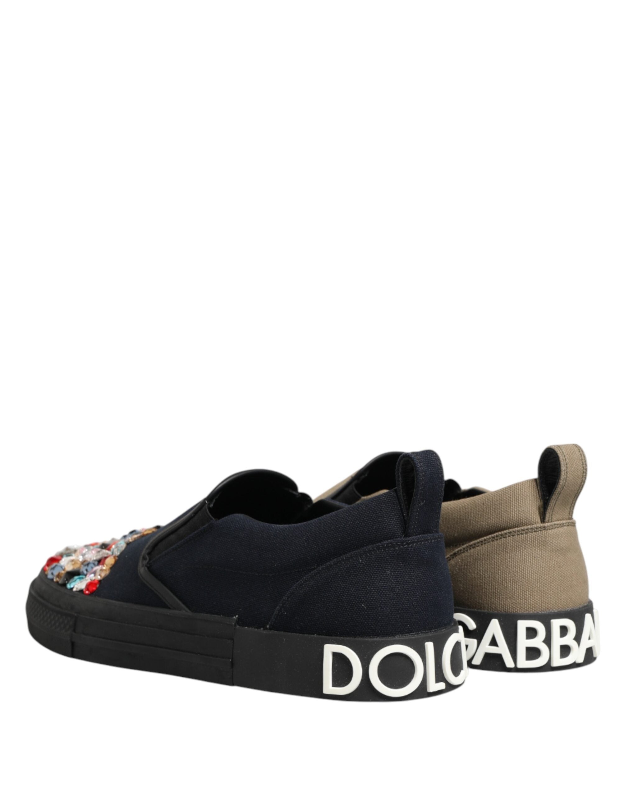 Elevate your style with Dolce & Gabbana's Blue Canvas Embellished Slip On Sneakers, where Italian craftsmanship meets opulent design for the discerning fashion lover.