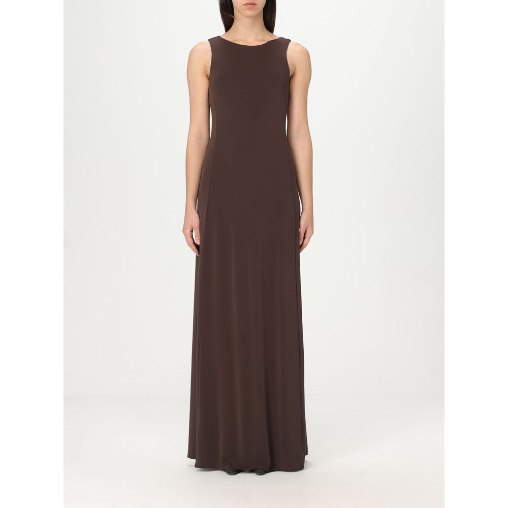 Discover the Max Mara Black Jersey Casual Dress, a timeless blend of sophistication and versatility, perfect for the discerning individual seeking effortless elegance.