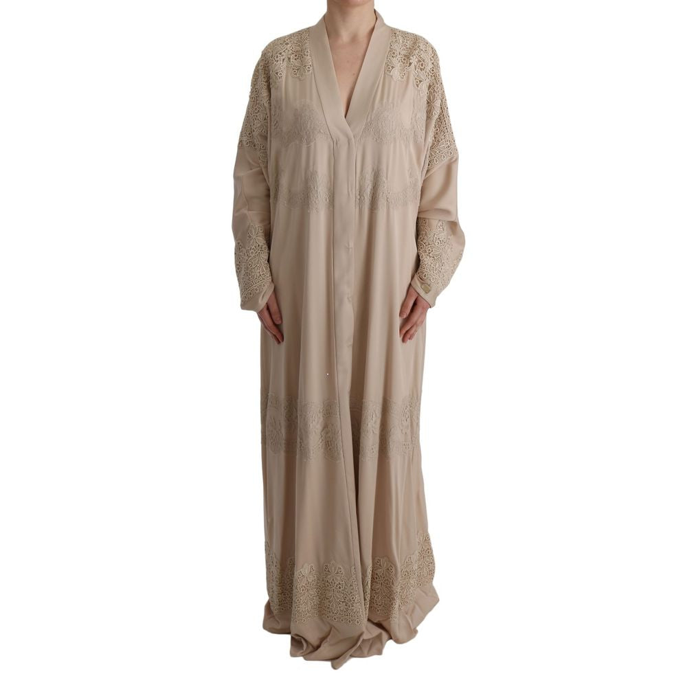 Elevate your wardrobe with the Dolce & Gabbana Beige Silk Full-Length Jacket, an exquisite blend of luxury and artistry, crafted in Italy for timeless sophistication.