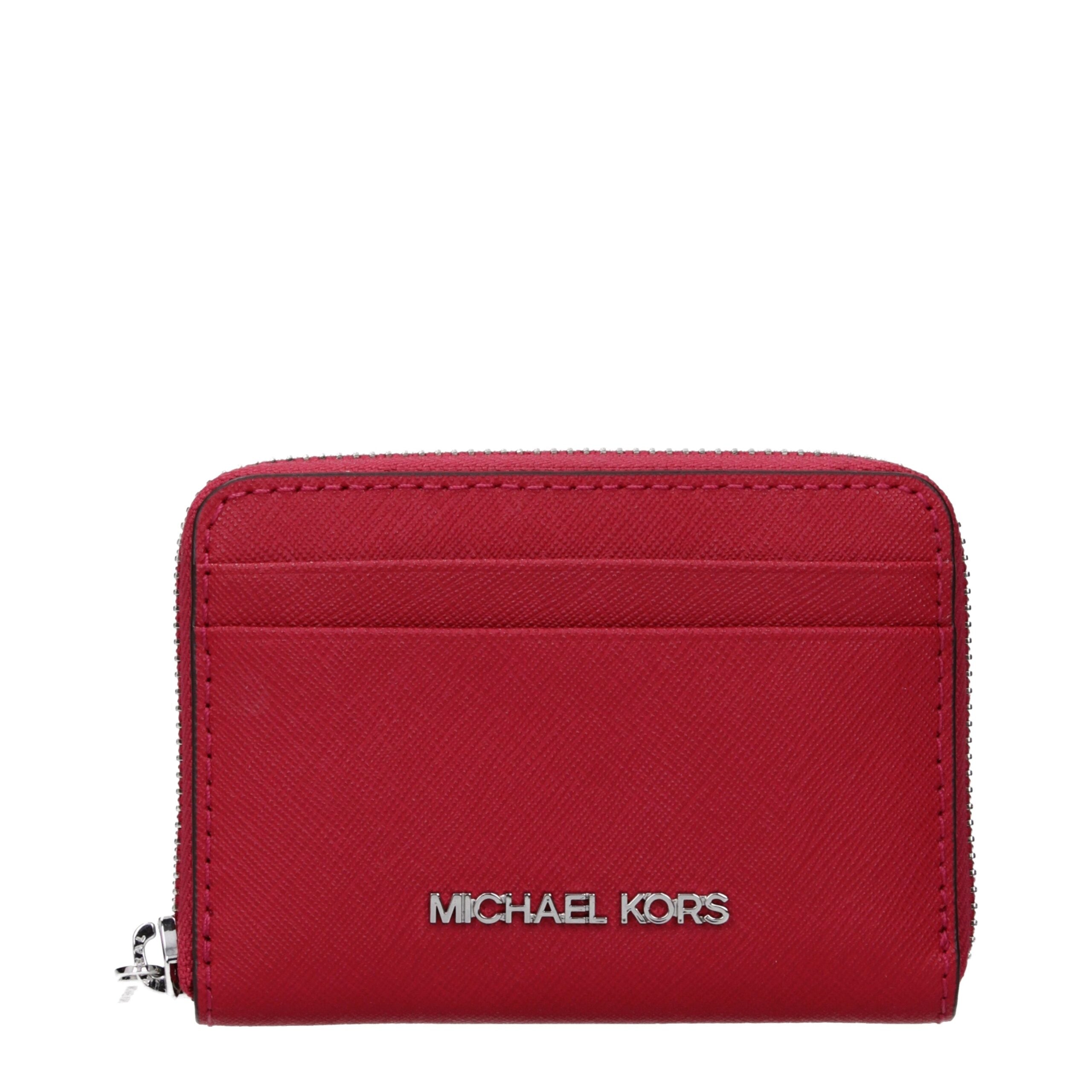 Experience the allure of the Michael Kors Red Leather Cardholder, a timeless symbol of sophistication and craftsmanship, designed to elevate your style with luxurious elegance.