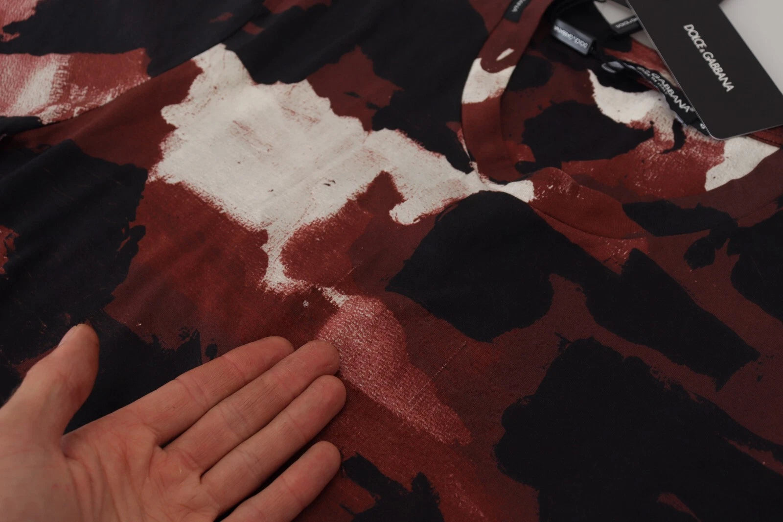 Indulge in the exquisite Dolce & Gabbana Multicolor Tie Dye Cotton Crew Neck T-shirt, a masterpiece of Italian craftsmanship that elevates your wardrobe with playful sophistication.