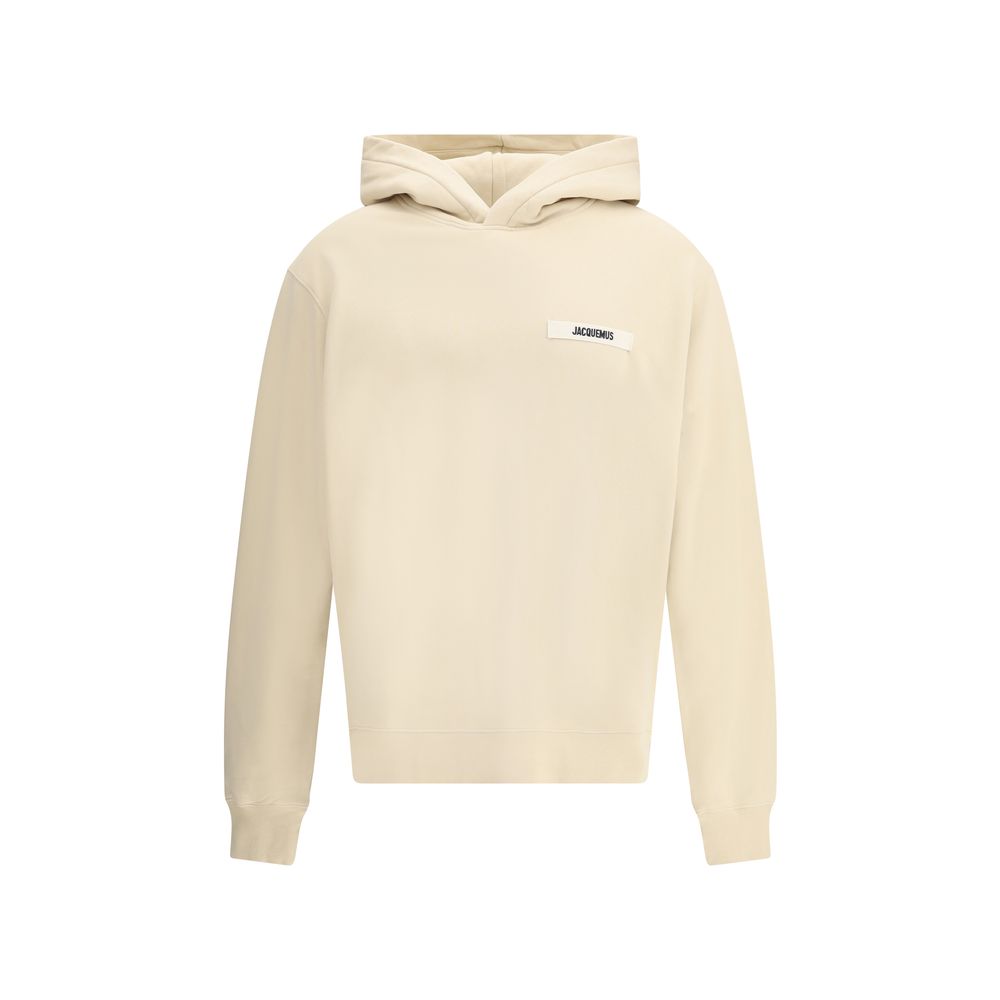 Indulge in the Jacquemus Beige Cotton Sweatshirt from the SS26 collection, where luxurious 100% cotton meets contemporary elegance for a timeless statement of style.