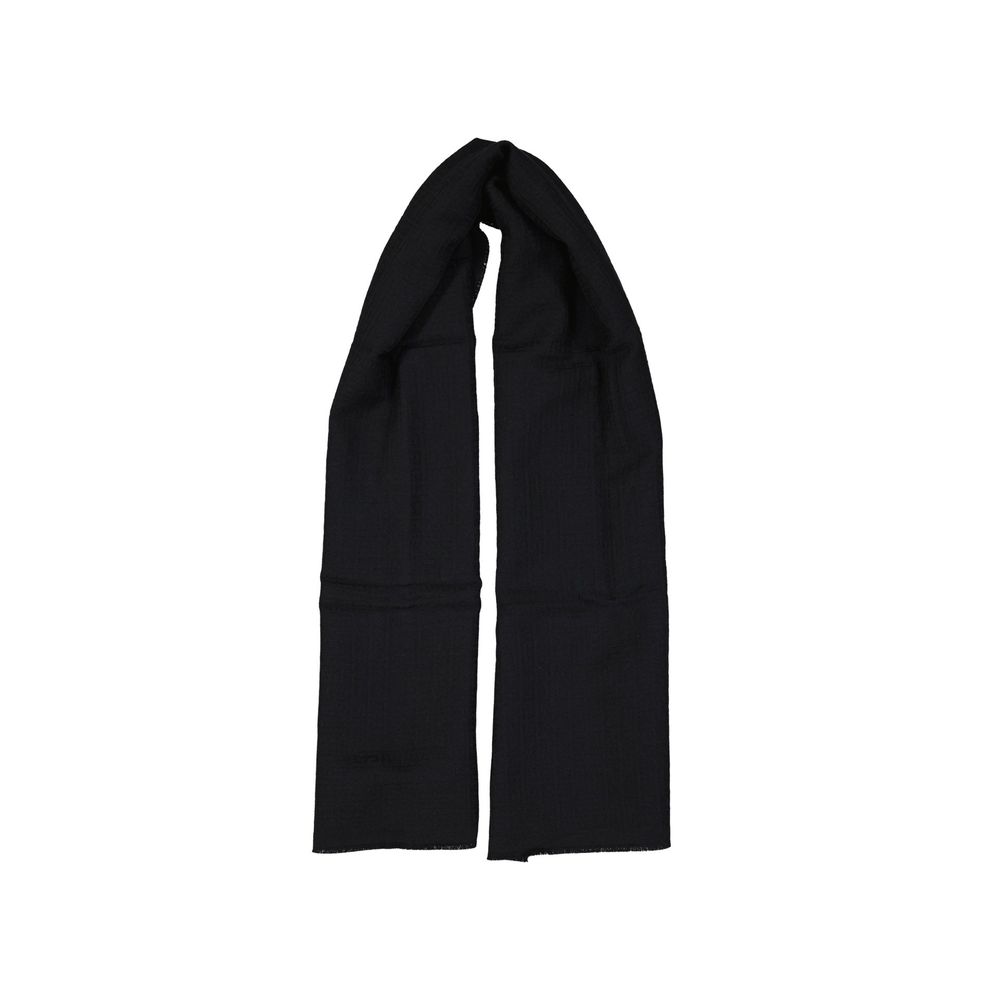 Elevate your style with the Givenchy Black Virgin Wool Scarf, a handcrafted masterpiece of luxurious materials, embodying timeless elegance and sophistication.