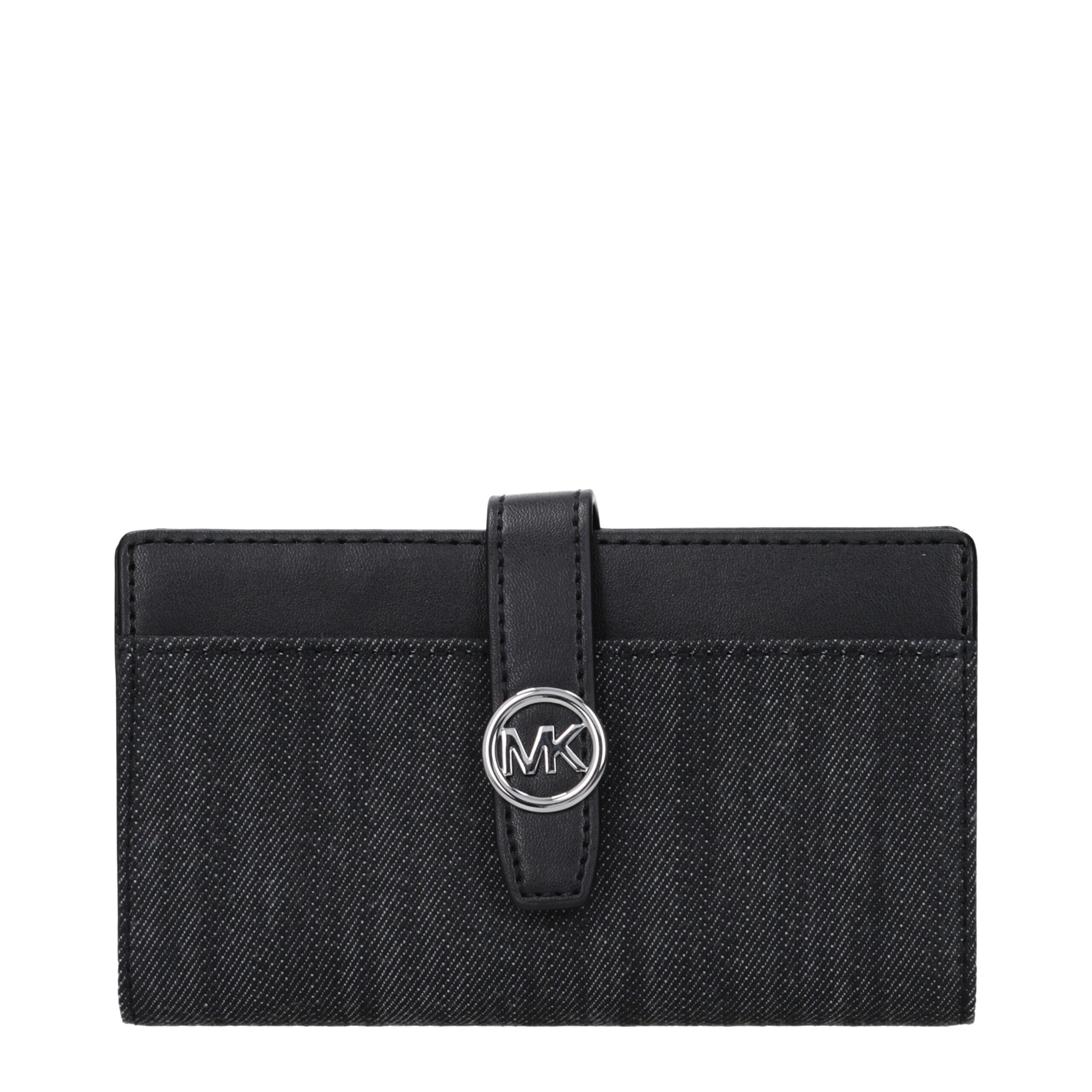 Elevate your elegance with the Michael Kors Black Fabric Wallet, a luxurious blend of exceptional craftsmanship and timeless sophistication for the discerning individual.