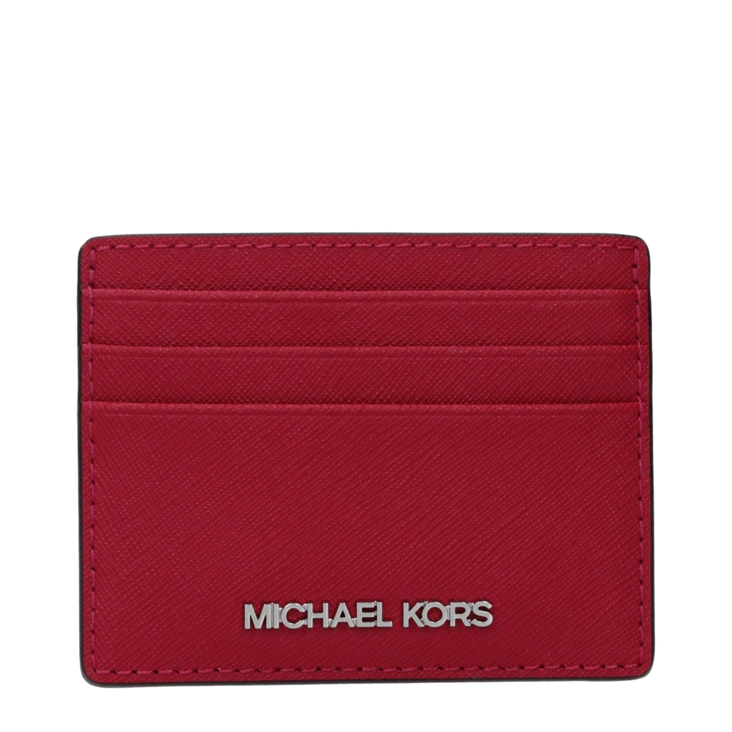 Elevate your elegance with the Michael Kors Red Leather Cardholder, a luxurious accessory crafted from premium leather, embodying timeless sophistication for discerning tastes.