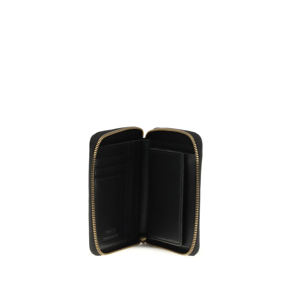 Discover the PINKO Black Calf Leather Bos Taurus Wallet, a symbol of luxury craftsmanship and timeless elegance, perfect for the discerning individual seeking sophistication.
