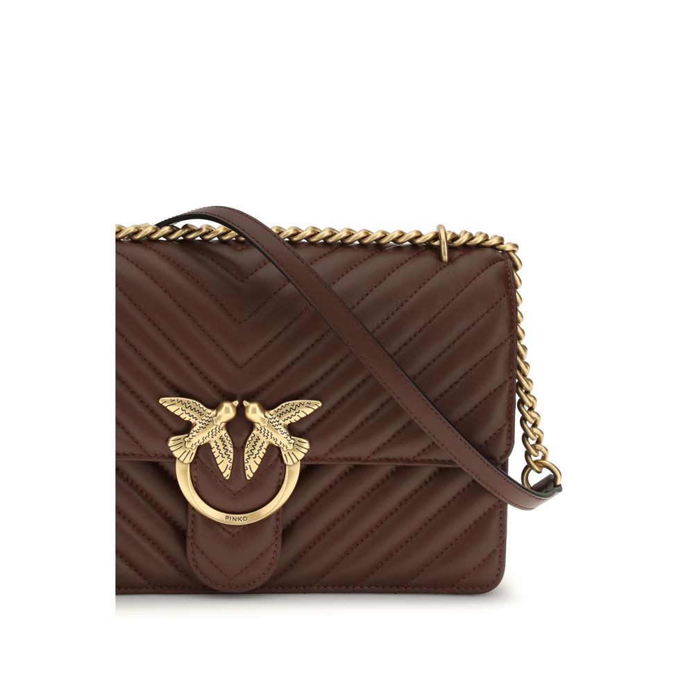 Discover the PINKO Brown Calf Leather Bos Taurus Shoulder Bag, a luxurious blend of exquisite craftsmanship and timeless elegance, perfect for elevating any ensemble.