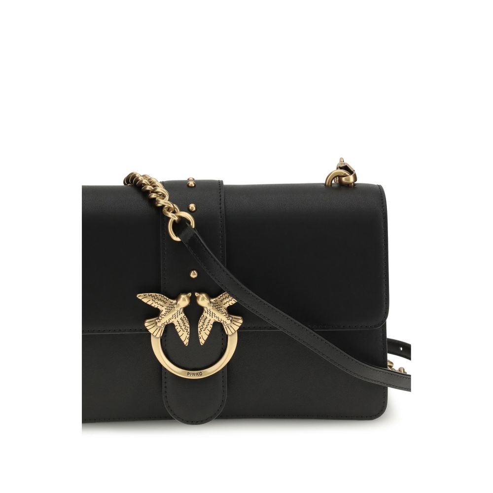 Elevate your elegance with the PINKO Black Calf Leather Bos Taurus Shoulder Bag, a masterpiece of artisanal luxury, crafted for those who embody sophistication and style.