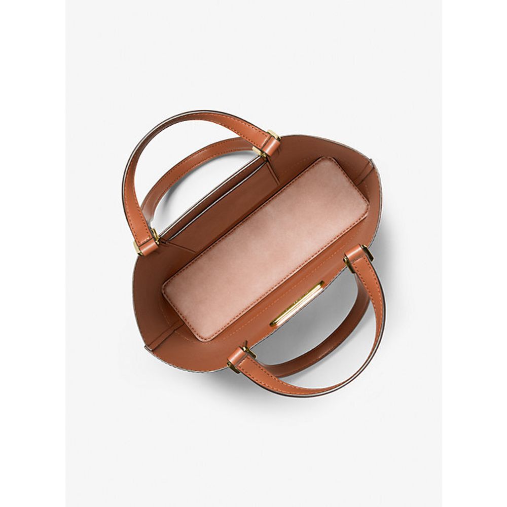 Elevate your style with the Michael Kors Brown Leather Tote Bag from the Kelli collection, a testament to luxurious craftsmanship and timeless elegance.