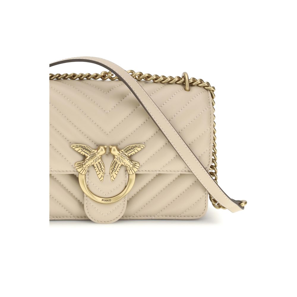 Indulge in the PINKO Beige Calf Leather Bos Taurus Shoulder Bag, a masterpiece of SS26 collection, blending exquisite craftsmanship with timeless elegance for the discerning individual.