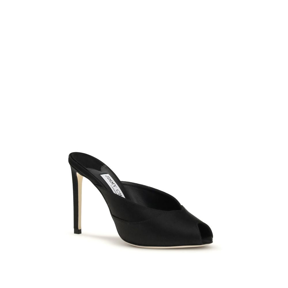 Step into unparalleled elegance with Jimmy Choo's Black Calf Leather Bos Taurus Stiletto Heel Sandals, where exquisite craftsmanship and timeless sophistication elevate your style.