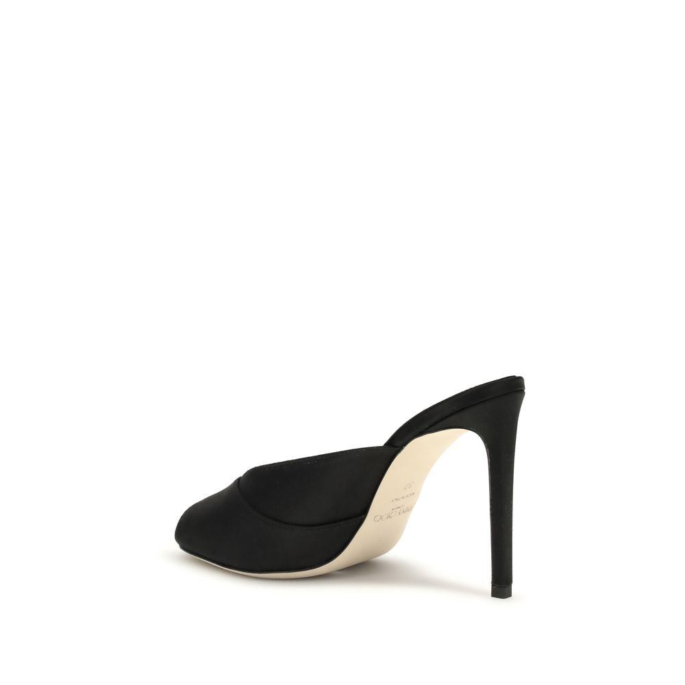 Experience the allure of Jimmy Choo Black Calf Leather Bos Taurus Stiletto Heel Sandals, where exquisite craftsmanship meets timeless elegance for the discerning individual.