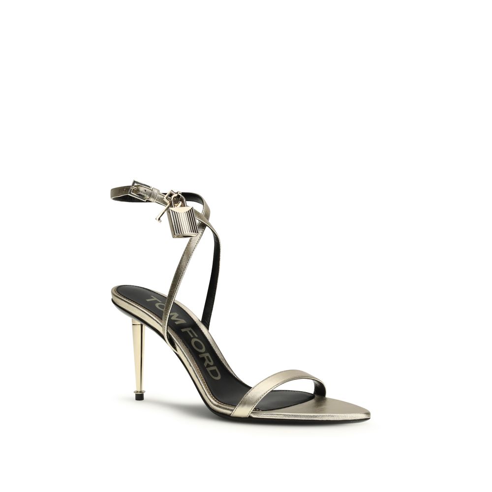 Experience the exquisite allure of Tom Ford Gold Calf Leather Bos Taurus Stiletto Heel Sandals, where timeless elegance meets unparalleled craftsmanship for a luxurious statement.