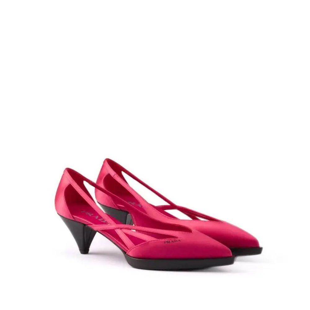 Step into the realm of luxury with Prada's Multicolor Silk Mid Heel Pumps, where exquisite silk meets timeless elegance, perfect for the discerning individual.
