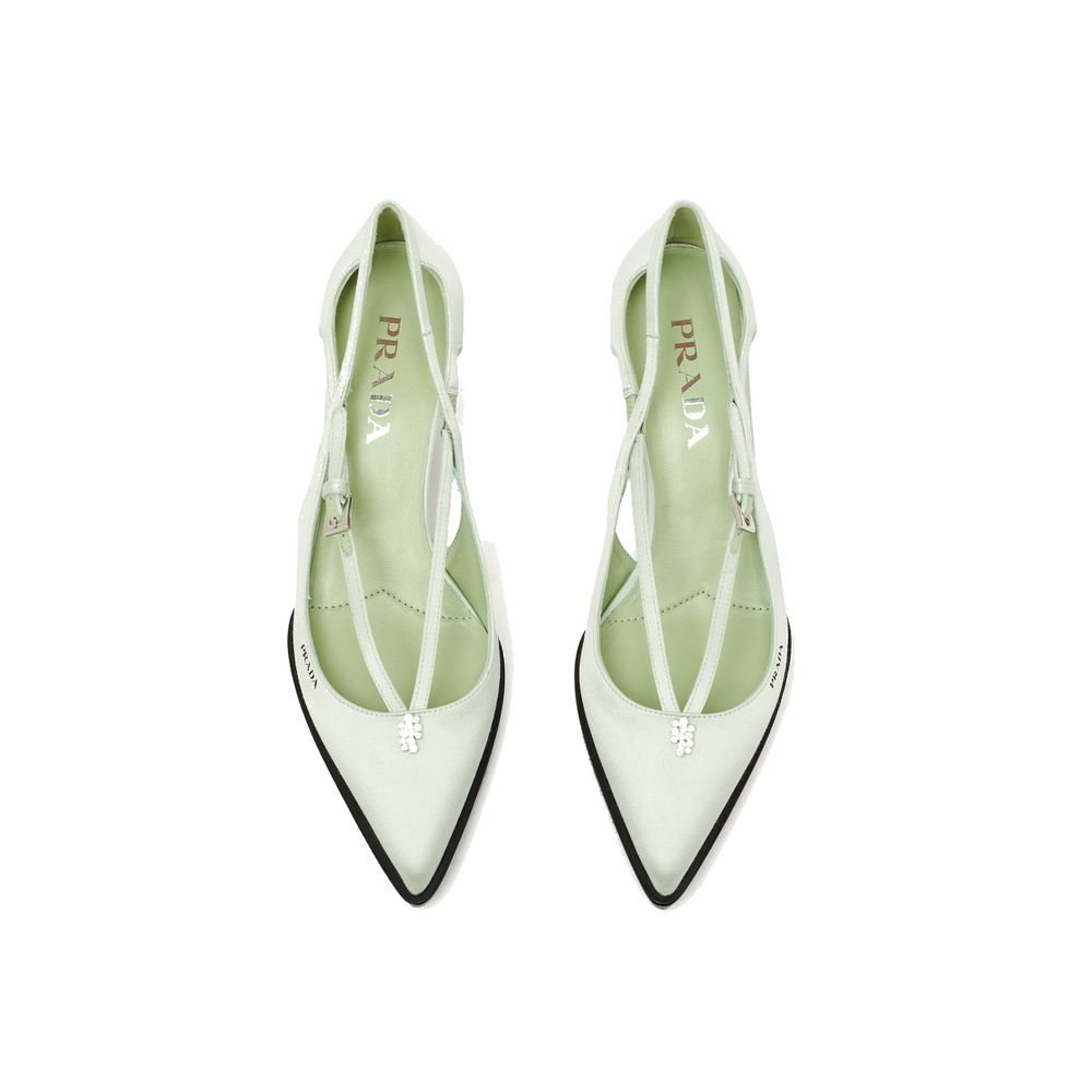 Elevate your elegance with Prada Bicolor Silk Mid Heel Pumps, crafted from luxurious silk and adorned with a jeweled ornament, perfect for any sophisticated occasion.