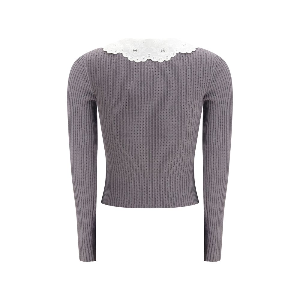 Elevate your wardrobe with the Self-Portrait Gray Viscose Shirt, a luxurious blend of sophistication and romance, perfect for the modern connoisseur of style.