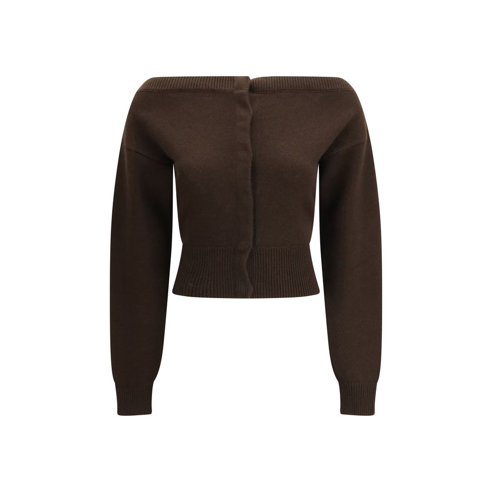 Indulge in the Tom Ford Brown Cashmere Cardigan, a masterpiece of 100% pure cashmere, exuding elegance and sophistication for the discerning individual.
