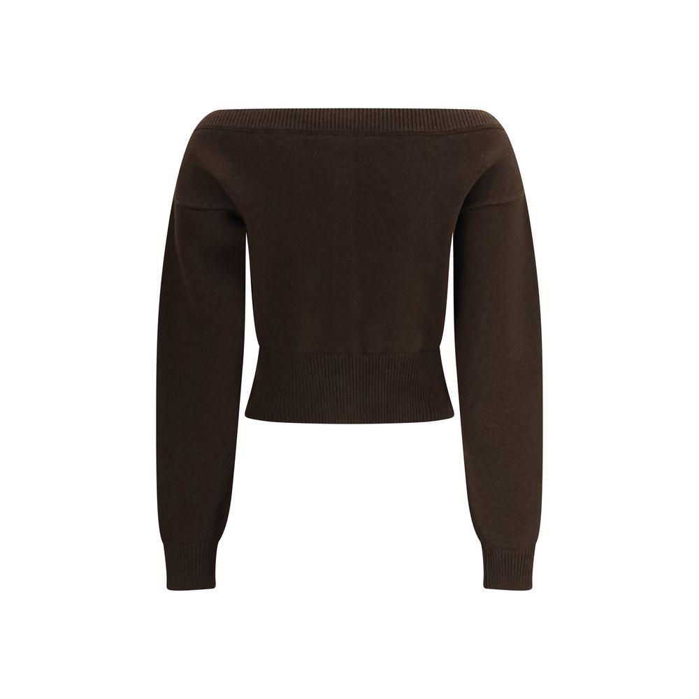 Indulge in the Tom Ford Brown Cashmere Cardigan, a masterpiece of 100% pure cashmere that embodies sophistication and elegance for the discerning individual.