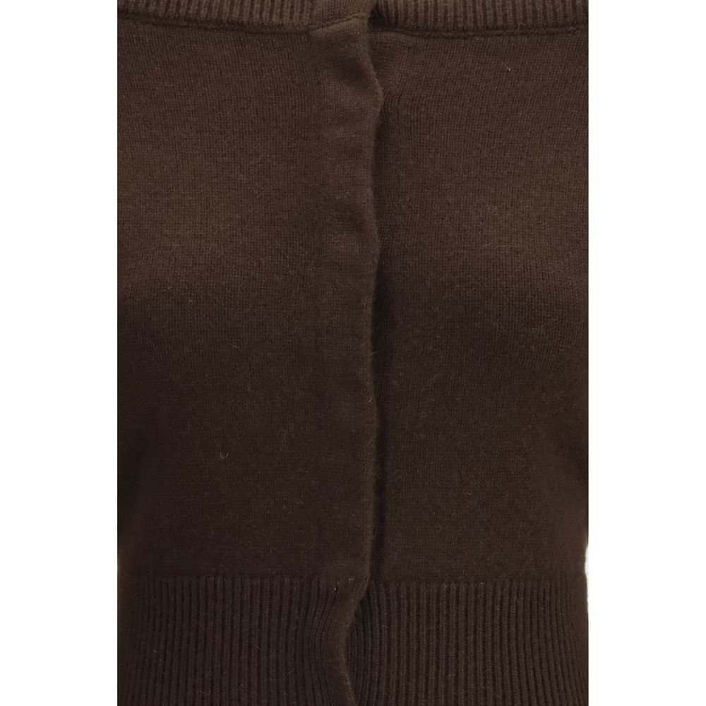 Indulge in the Tom Ford Brown Cashmere Cardigan, a masterpiece of 100% pure cashmere from the SS26 collection, embodying elegance and sophistication for the discerning individual.