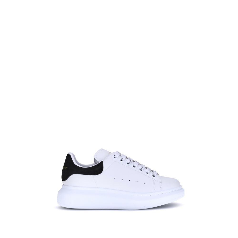 Step into a realm of unparalleled luxury with Alexander McQueen's White Calf Leather Bos Taurus Platform Sneakers, where exquisite craftsmanship meets timeless elegance for the discerning connoisseur.