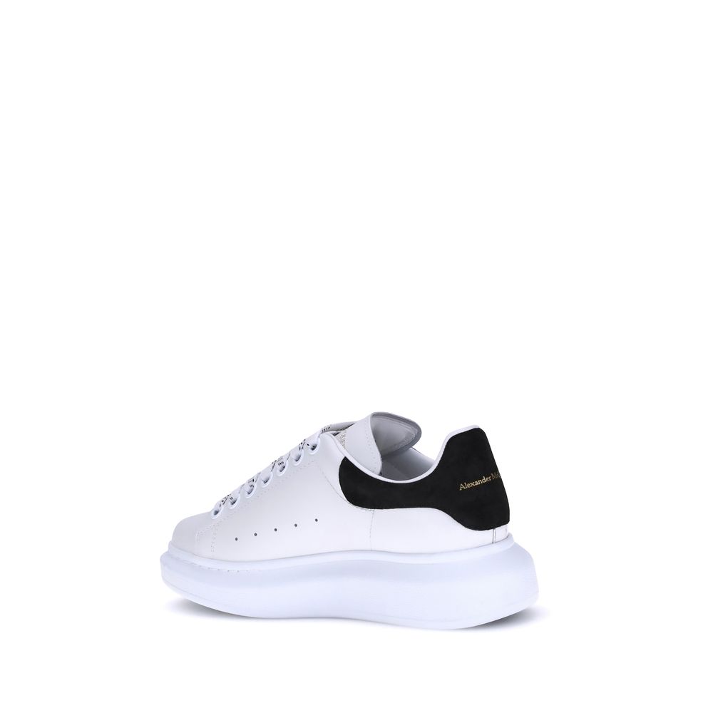 Elevate your style with Alexander McQueen's White Calf Leather Bos Taurus Platform Sneakers, a masterpiece of luxury craftsmanship that redefines sophistication and allure.