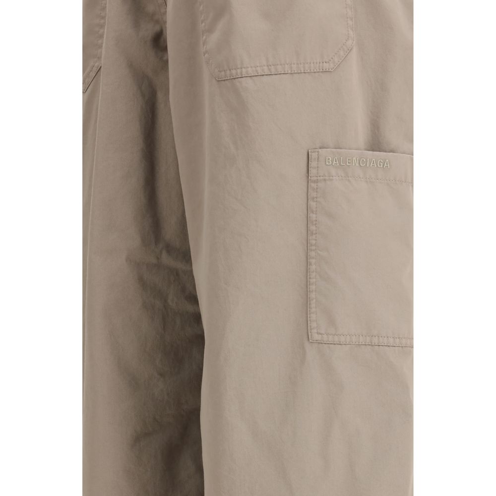 Experience the allure of Balenciaga's Beige Cotton Casual Pants, where luxurious craftsmanship meets modern elegance, perfect for the discerning individual.