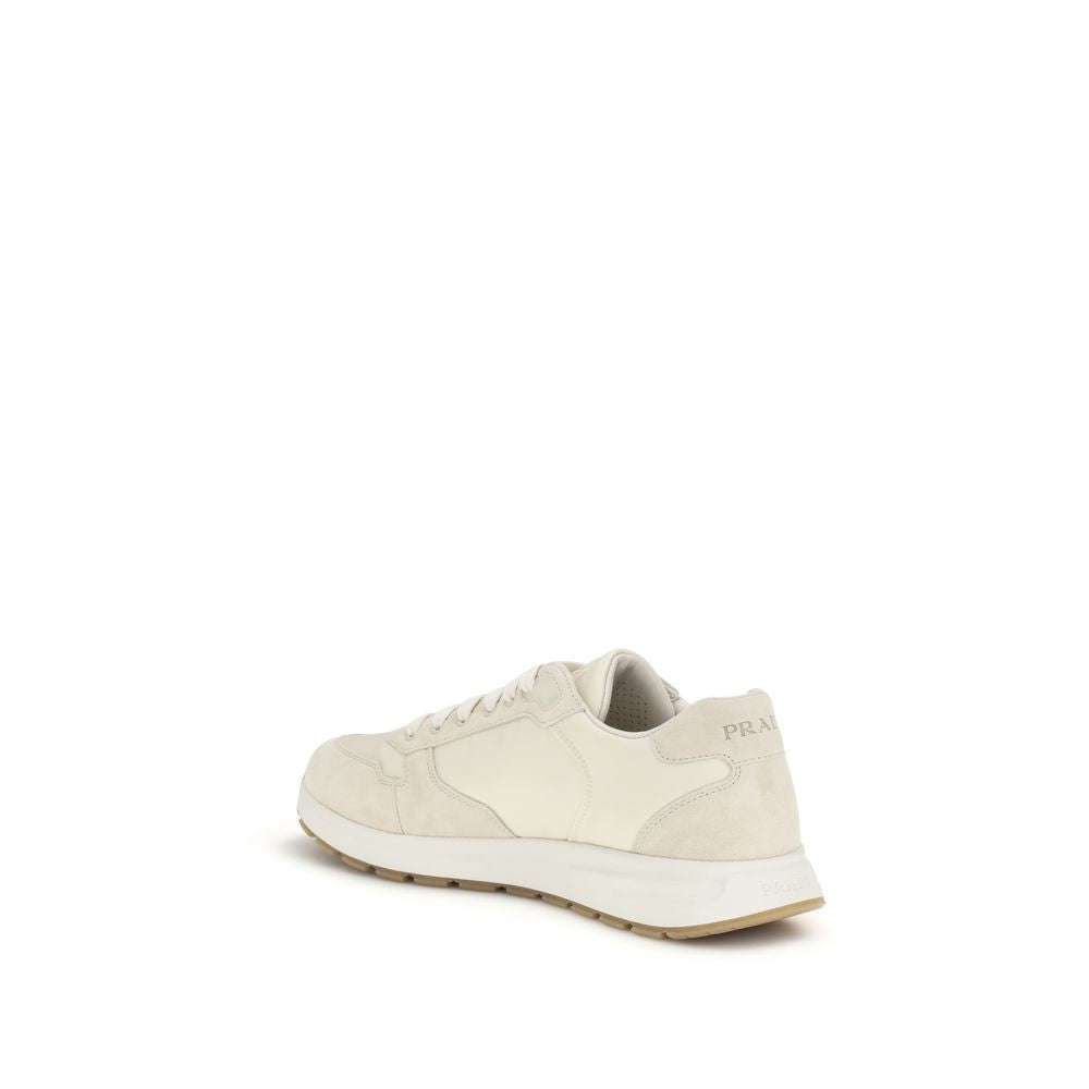 Step into sophistication with Prada Beige Nylon Low Top Sneakers, where luxurious Re-Nylon and suede redefine elegance for every occasion.