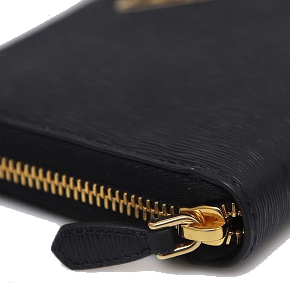 Indulge in the Prada Black Calfskin Wallet, a masterpiece of exquisite craftsmanship and timeless elegance, perfect for those who embrace luxury in every moment.