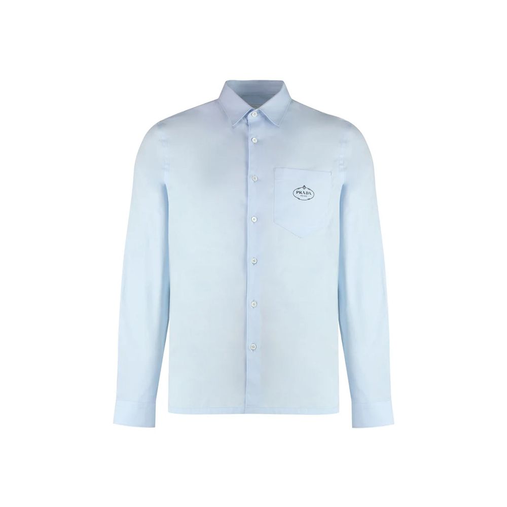 Elevate your wardrobe with the Prada Blue Cotton Dress Shirt, a timeless blend of Italian craftsmanship and modern elegance, perfect for any sophisticated occasion.