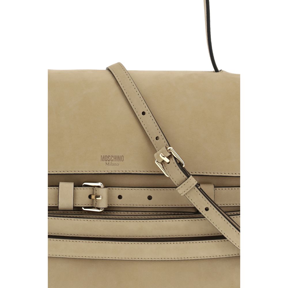 Indulge in the Moschino Beige Calf Leather Bos Taurus Handbag, a masterpiece of craftsmanship and elegance, perfect for elevating your sophisticated style.