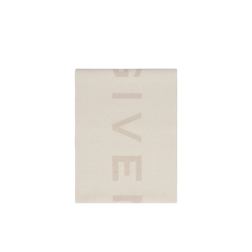 Indulge in the Givenchy Beige Cashmere Scarf, a masterpiece of Italian craftsmanship blending cashmere and wool for timeless elegance and unmatched warmth.