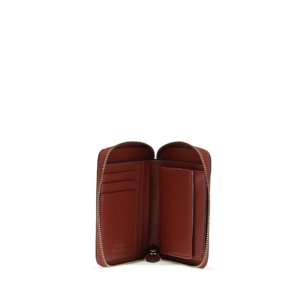 Discover the PINKO Bordeaux Calf Leather Bos Taurus Wallet, a masterpiece of artisanal luxury that embodies elegance and sophistication for the discerning individual.