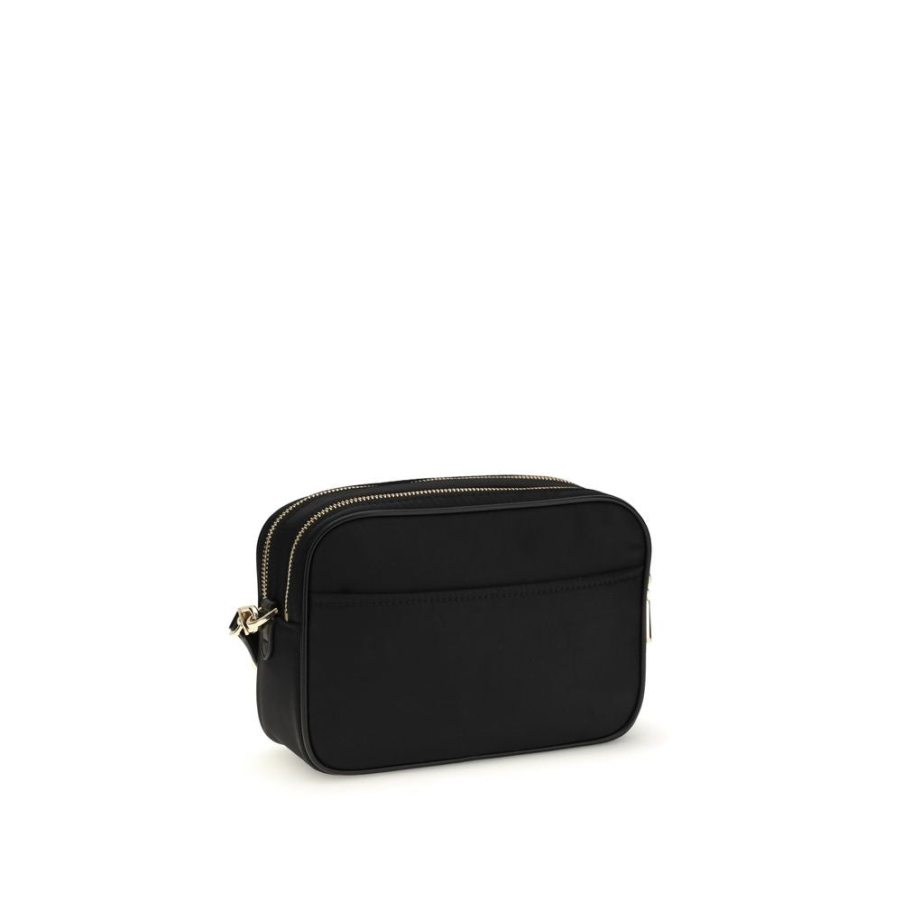 Discover the Michael Kors Black Polyethylene Wallet, a blend of exquisite craftsmanship and sustainable luxury, designed for the discerning individual who values elegance.