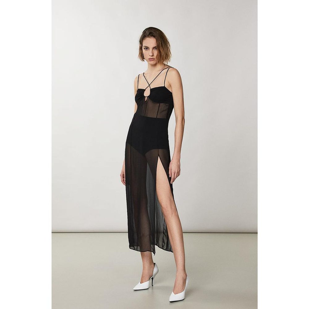 Experience the allure of the Patrizia Pepe Black Viscose Cocktail Dress, a masterpiece of couture elegance crafted from luxurious viscose, designed to elevate your evening with timeless sophistication.