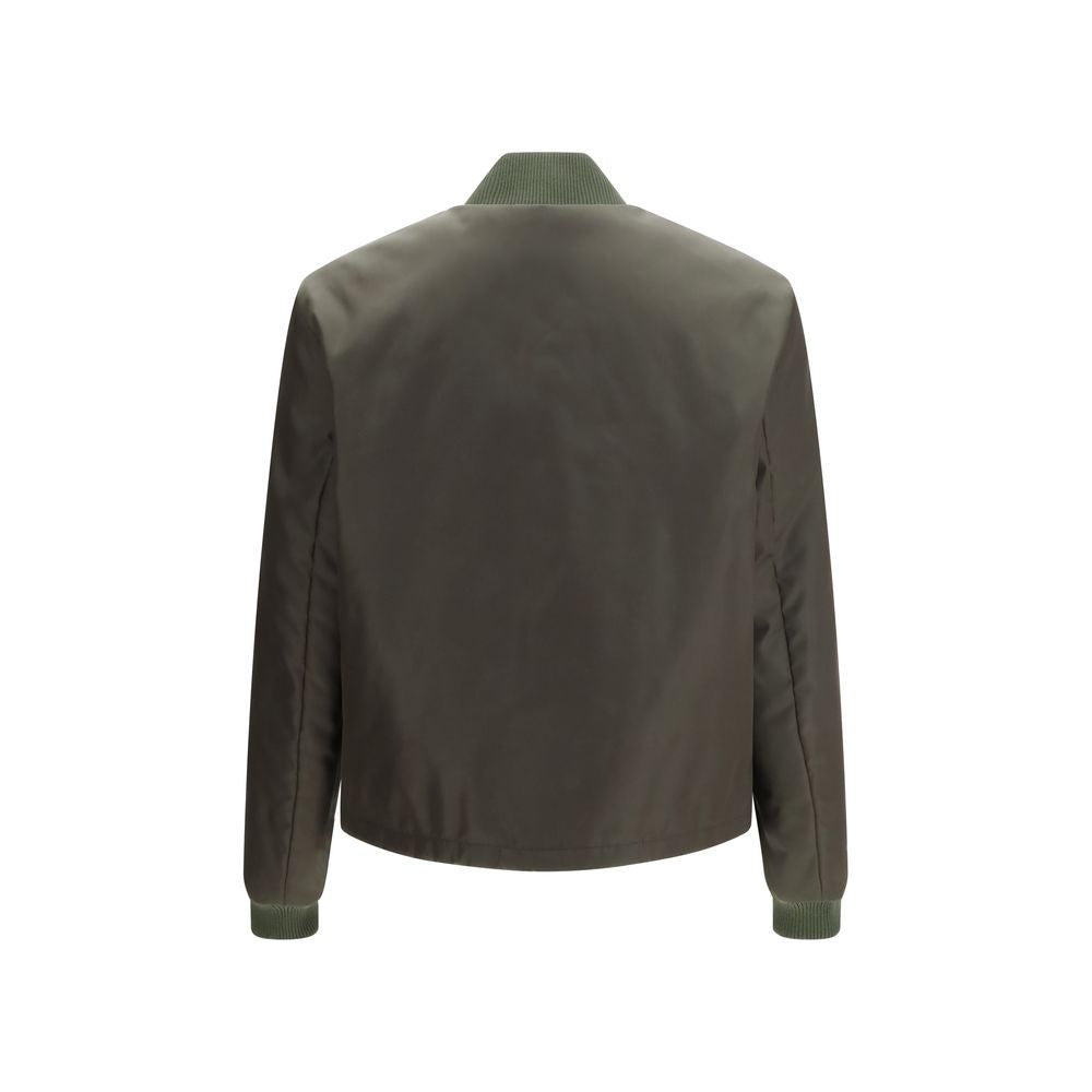 Discover the Prada Bicolor Nylon Bomber, a masterpiece of exquisite craftsmanship and luxurious design, perfect for elevating any sophisticated wardrobe.