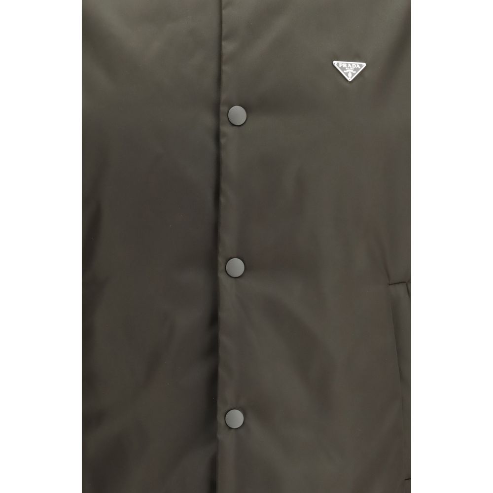 Elevate your wardrobe with the Prada Bicolor Nylon Bomber, a masterpiece of exquisite craftsmanship and luxurious design, perfect for the discerning individual.
