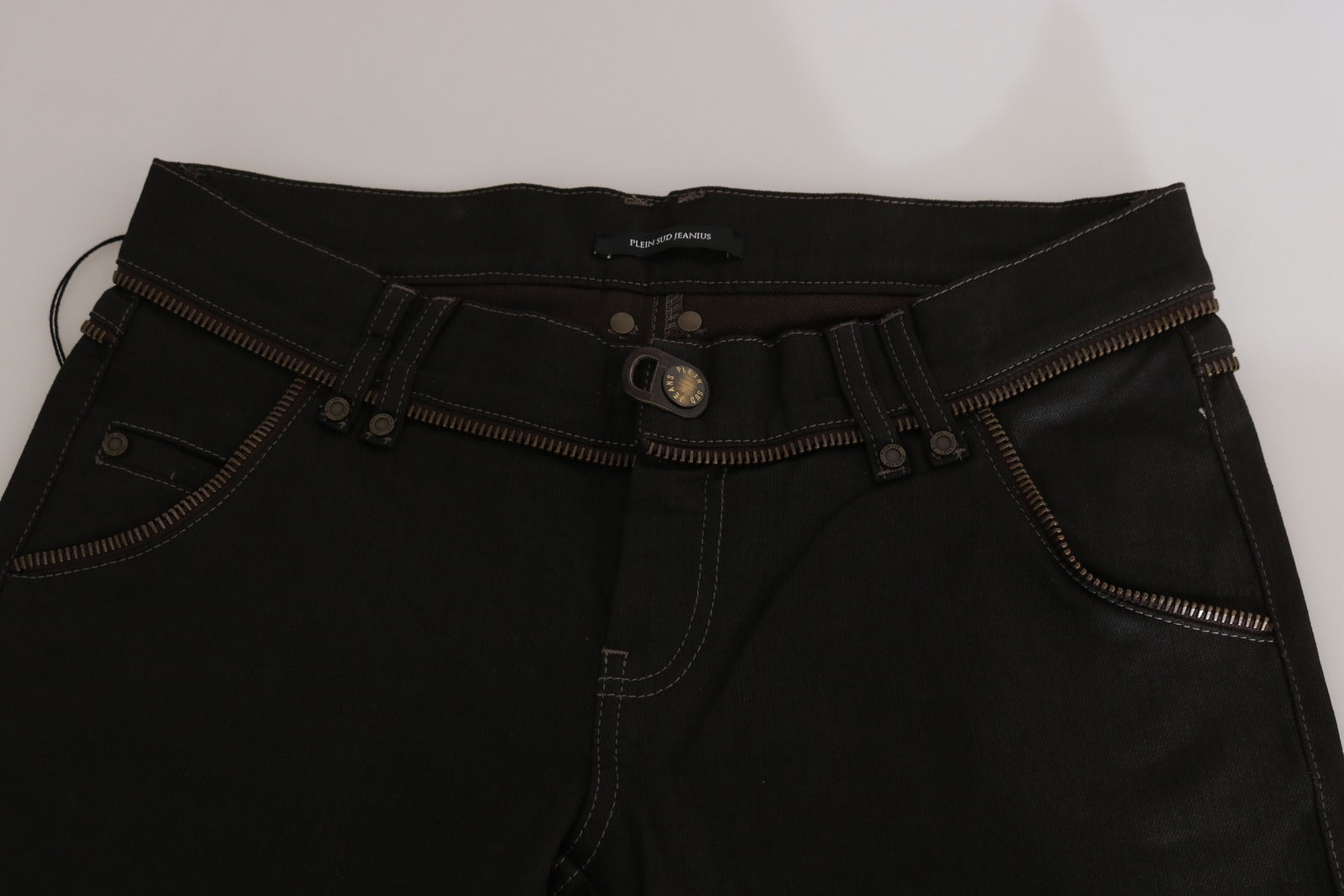Experience the allure of John Galliano's Cotton Black Mid Waist Skinny Denim Jeans, where exquisite craftsmanship meets timeless elegance for the discerning individual.