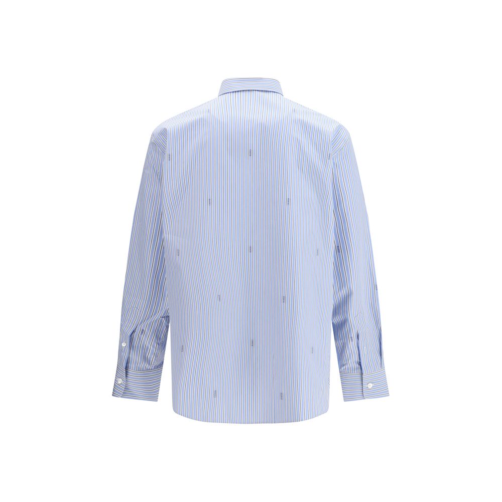 Elevate your wardrobe with the Gucci Light Blue Cotton Pattern Shirt, crafted from 100% certified cotton, embodying timeless elegance and exquisite craftsmanship for discerning individuals.