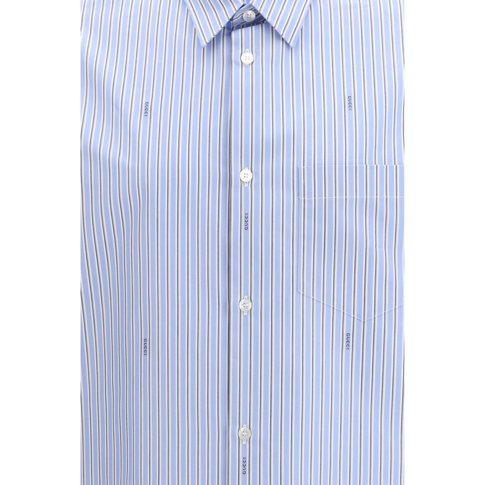 Elevate your wardrobe with the Gucci Light Blue Cotton Pattern Shirt, a masterpiece of exquisite craftsmanship and timeless elegance, perfect for the discerning individual.