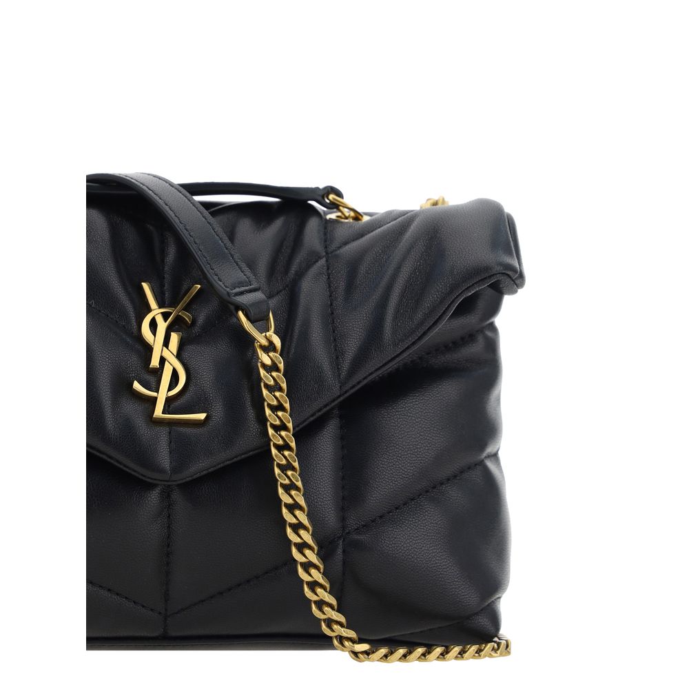 Indulge in the Saint Laurent Black Lamb Ovis Aries Aries Shoulder Bag, a masterpiece of luxury crafted from premium lamb leather, perfect for elevating any ensemble.