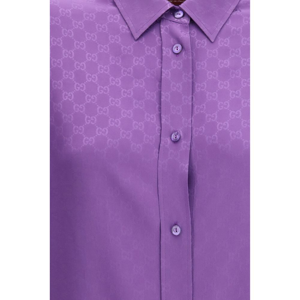 Discover the Gucci Multicolor Silk Pattern Shirt, a masterpiece of 100% silk from the SS26 collection, embodying timeless elegance and exquisite craftsmanship for the discerning individual.
