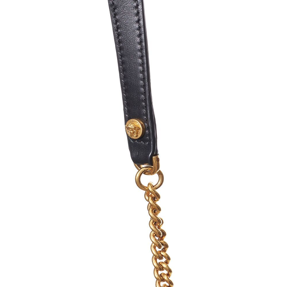 Discover the Versace Black And White Leather And Textile Shoulder Bag, a masterpiece of Italian craftsmanship that embodies luxury and elegance for the discerning connoisseur.