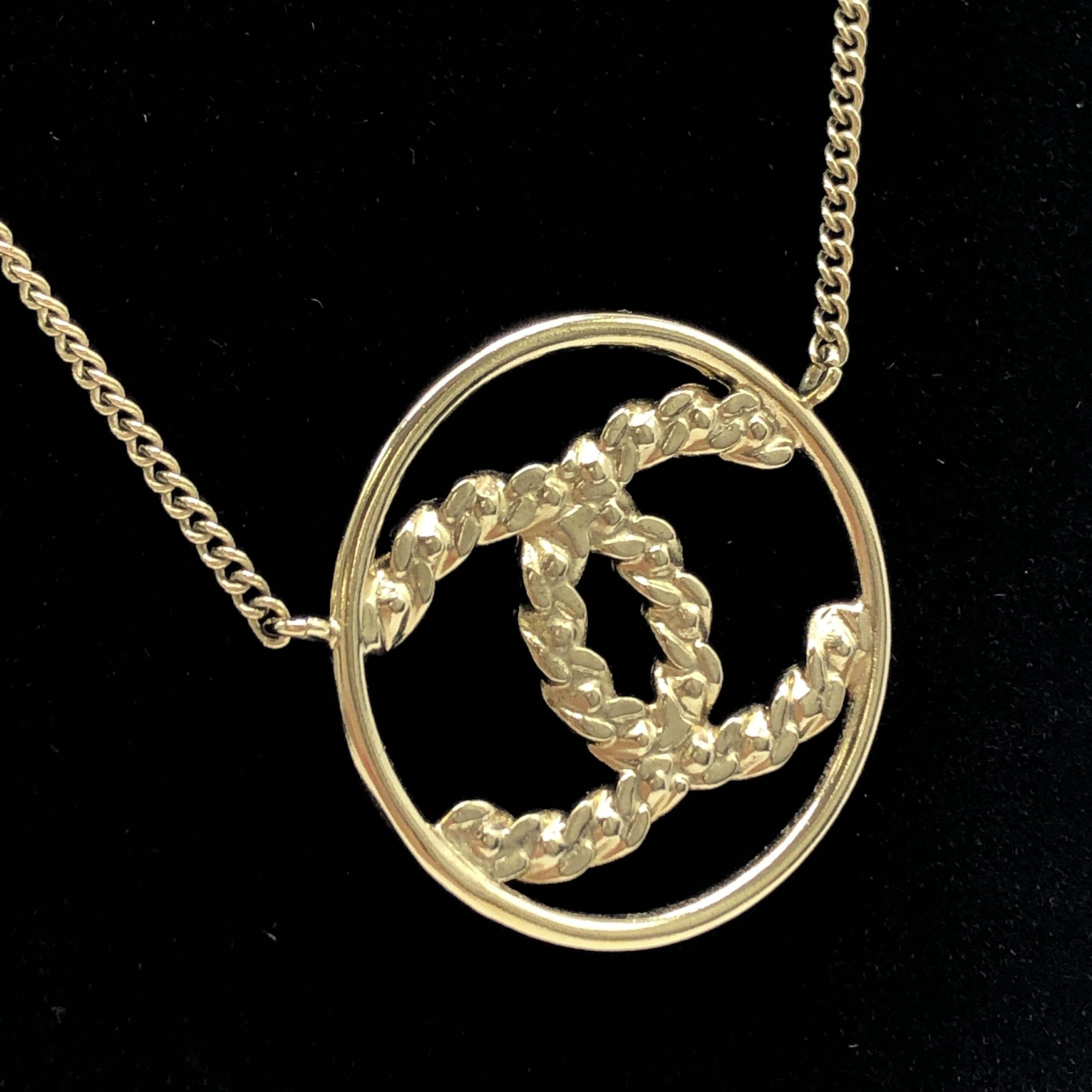 Chanel Gold Tone CC Circle Pendant Necklace - Artisanal Elegance